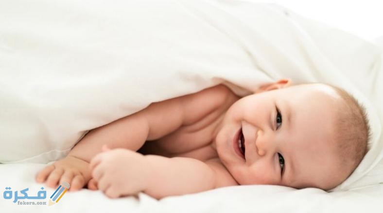 اجمل اسماء الذكور النادرة 1 A baby wrapped inside a blanket