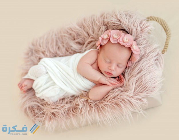 اسماء مواليد بنات مسيحية 2025 ومعانيها 1 cute newborn girl sleeping child basket 156881 697