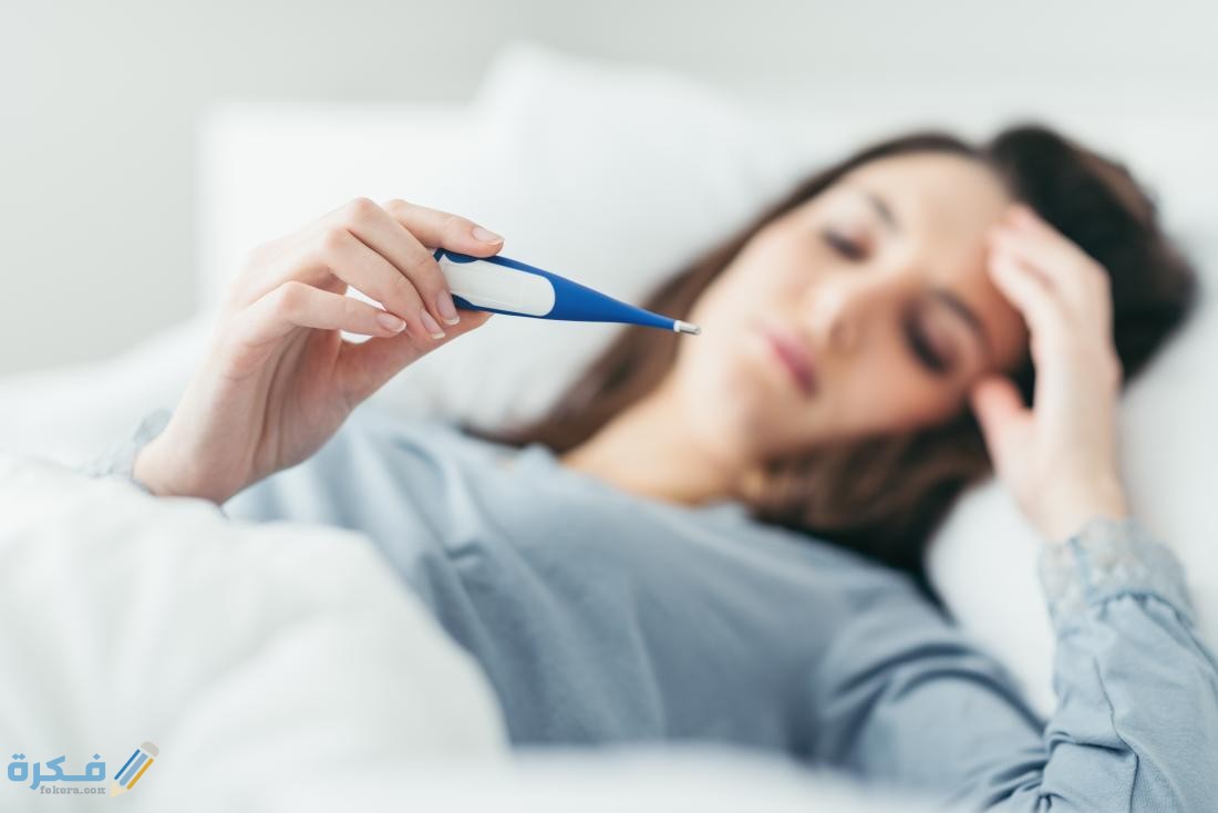 تفسير رؤية السخونة في المنام بالتفصيل 1 40104 woman in bed with a fever wondering if allergies can cause a fever
