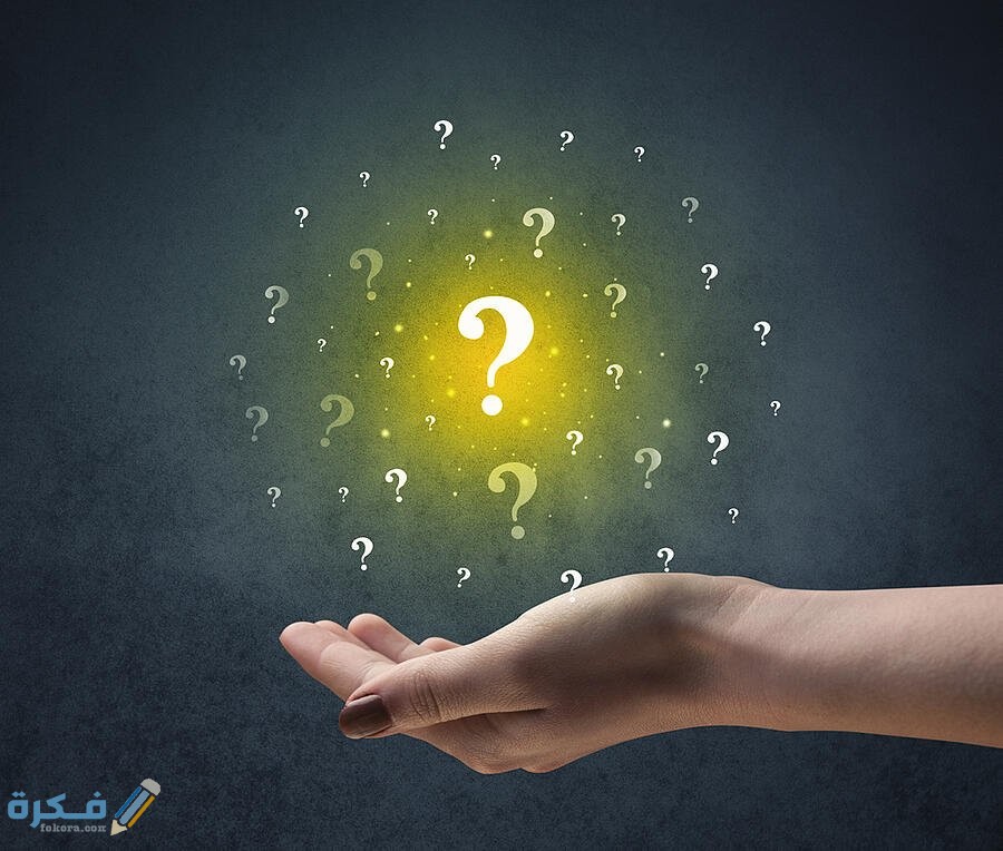اسم مهنة بحرف ع العين 1 Yellow question marks hovering over young hand