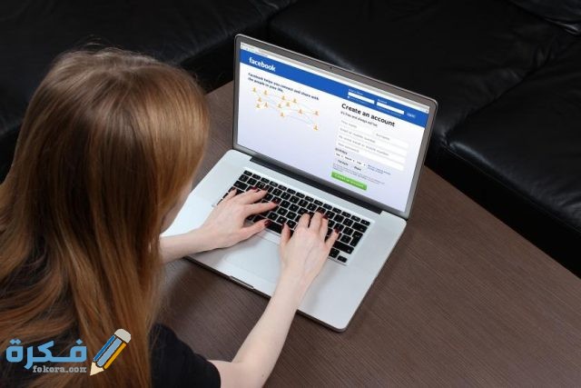 woman logging facebook