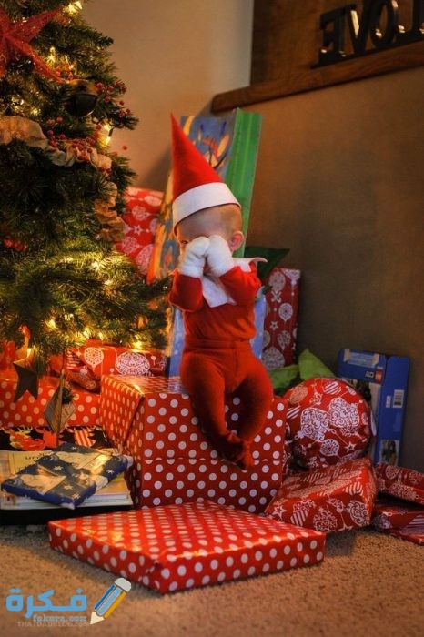 صور اطفال بملابس بابا نويل 14